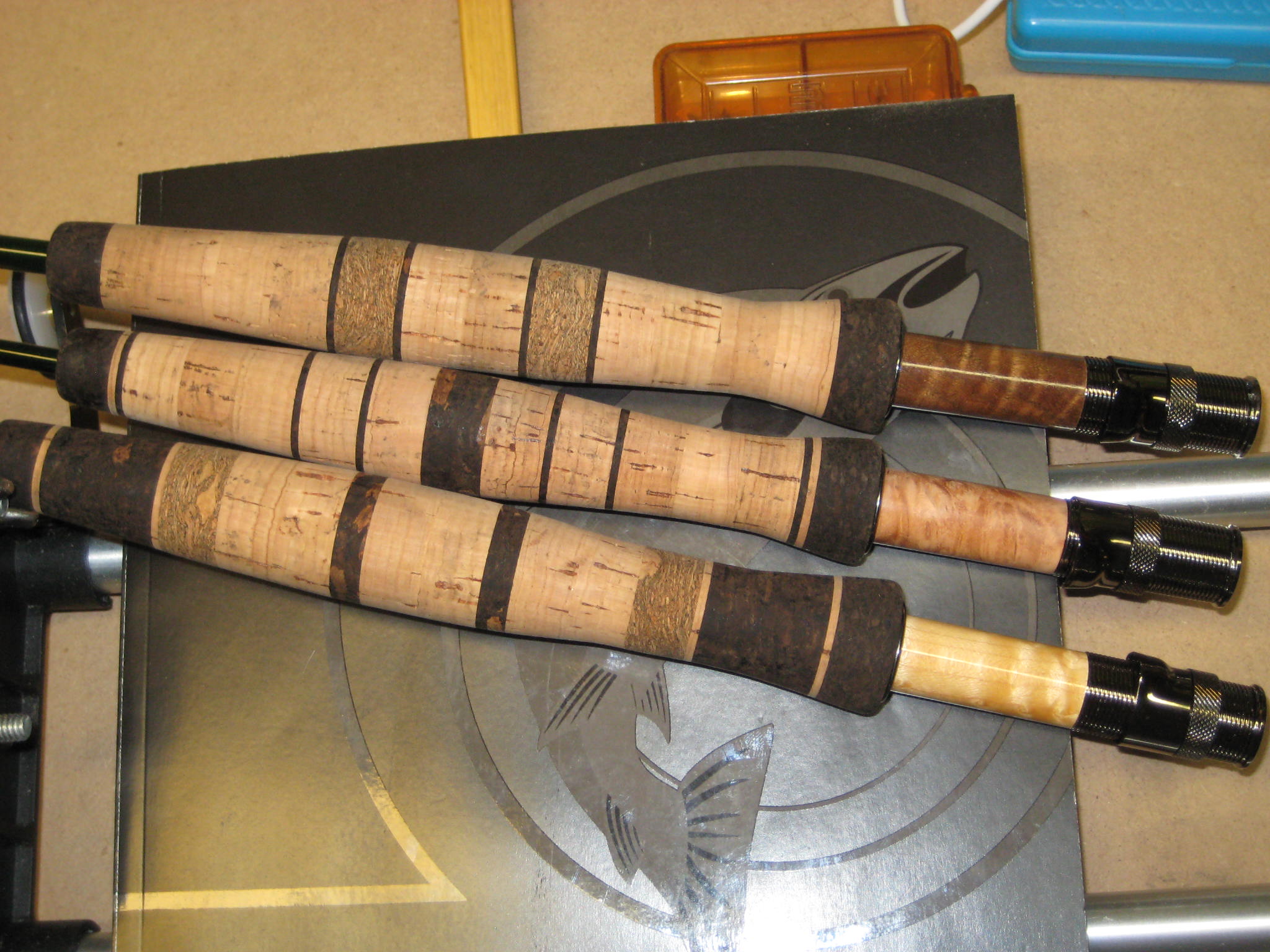 Walnut, Mappa Wood, and Maple inserts on fly reel seats